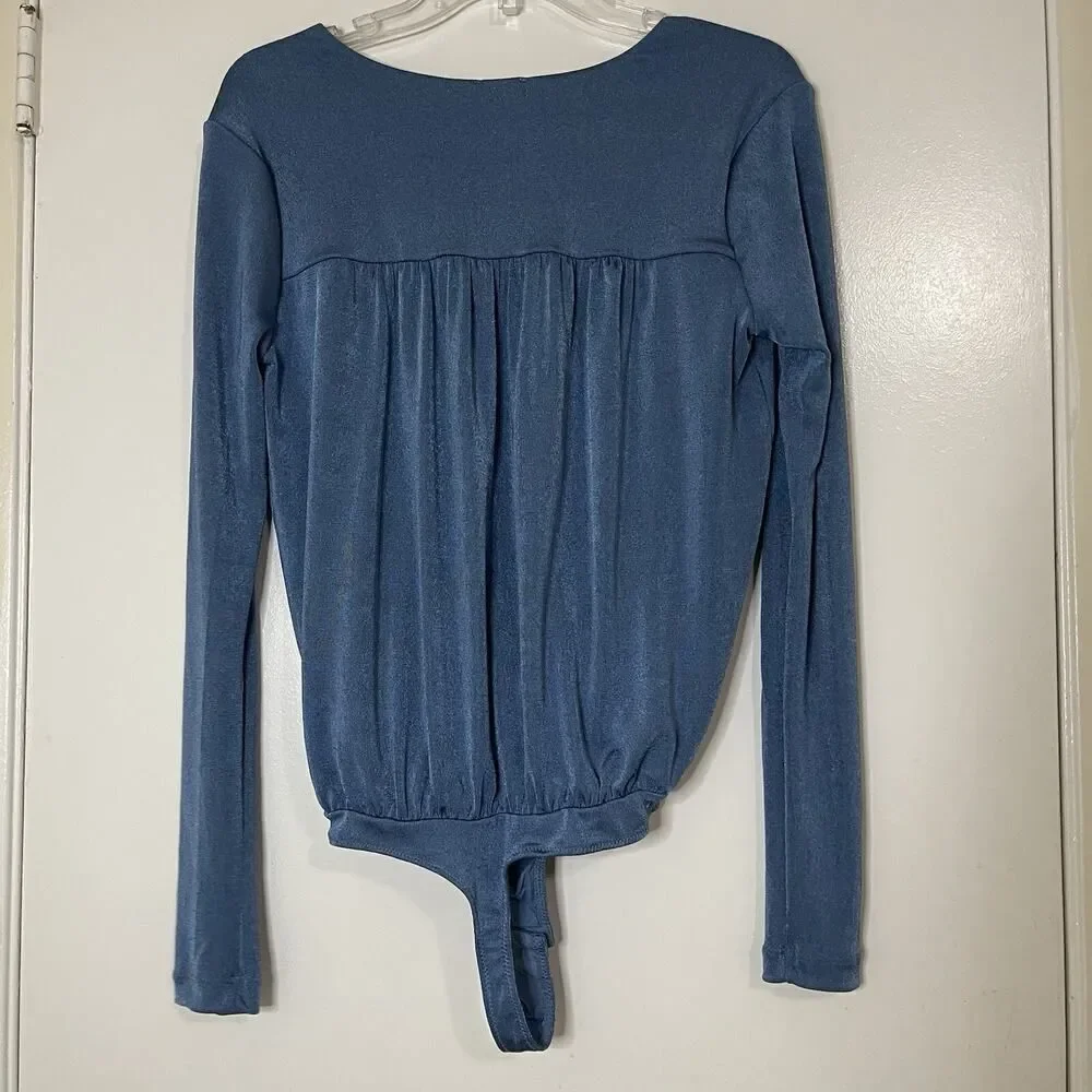 Free People intimately turnt sheen blue long sleeve plunge bodysuit Medium
